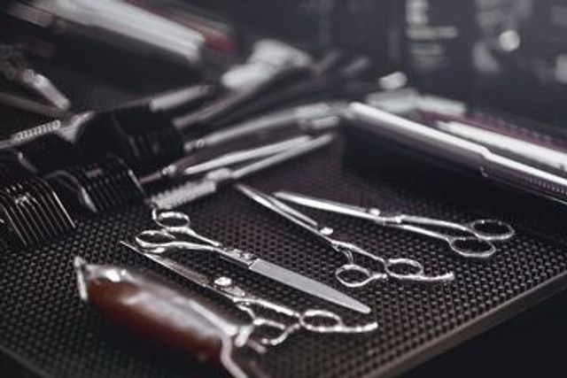 Professional barber tools arranged at International Barbershop